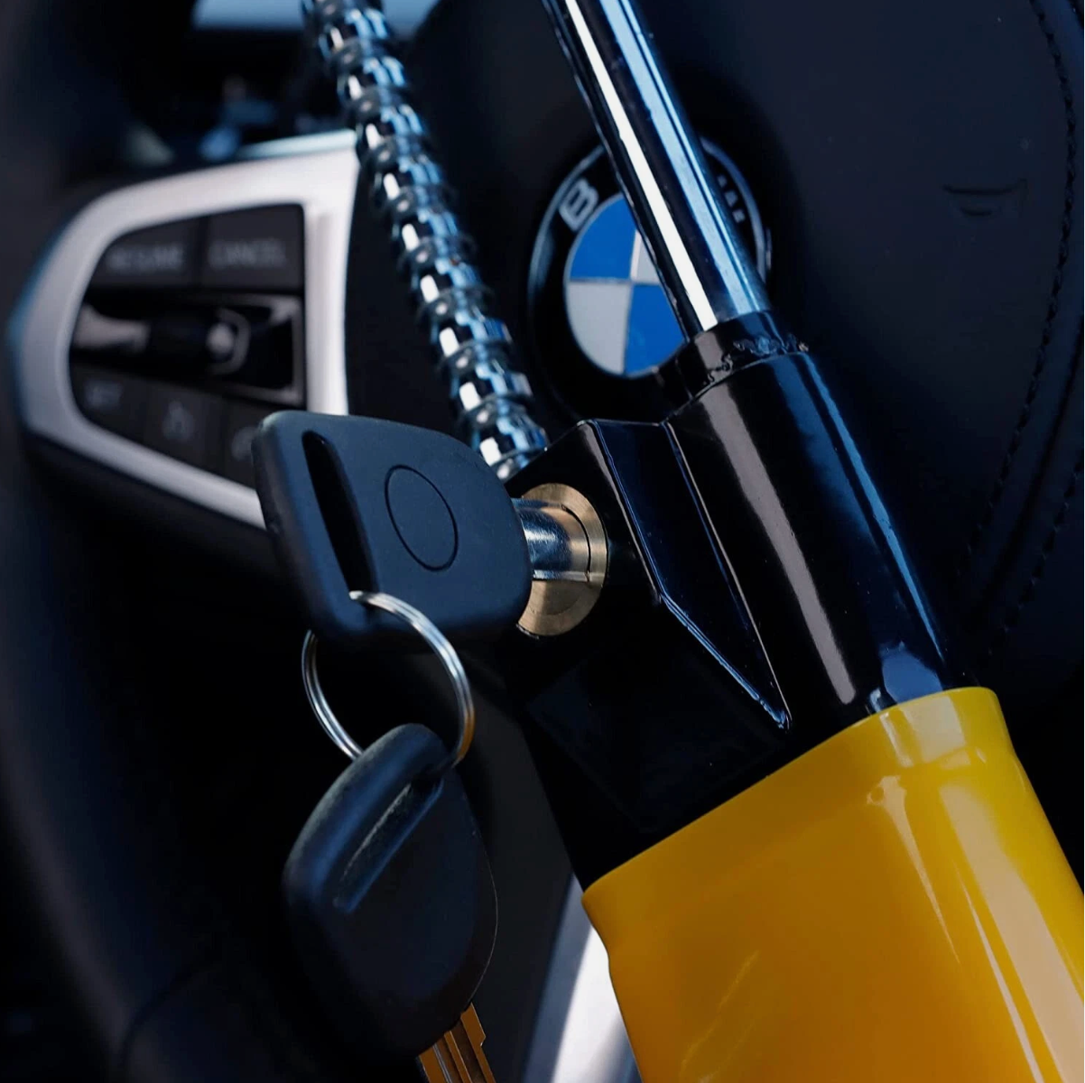 Close-up of a key attached to a  Heavy-Duty Twin Bar Anti-Theft Steering Wheel Lock