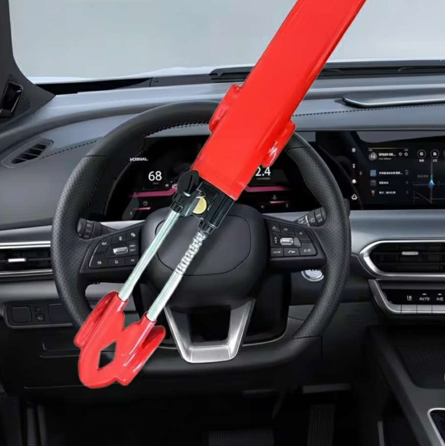 Red Heavy-Duty Twin Bar Anti-Theft Steering Wheel Lock installed on a car steering wheel
