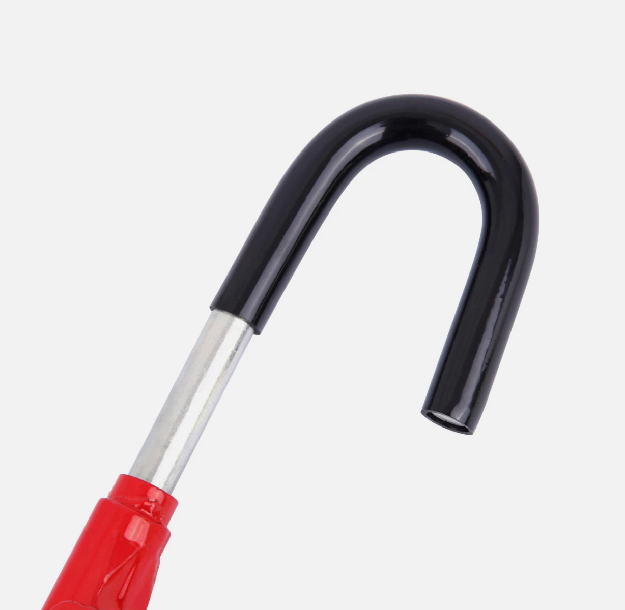 Close up of black part that fits to the steering wheel of the steering wheel to brake pedal lock on a white background