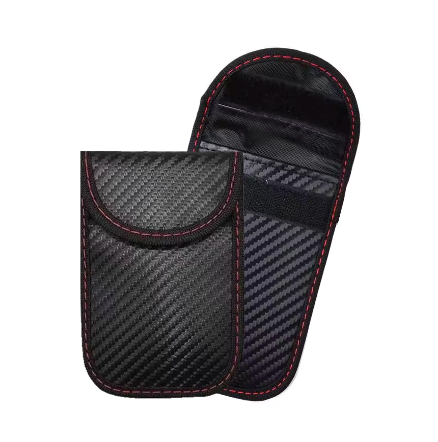 Black carbon fibre pattern signal blocking Faraday pouches, one with the flap closed and the other with the flap open and a red stitching on a white background