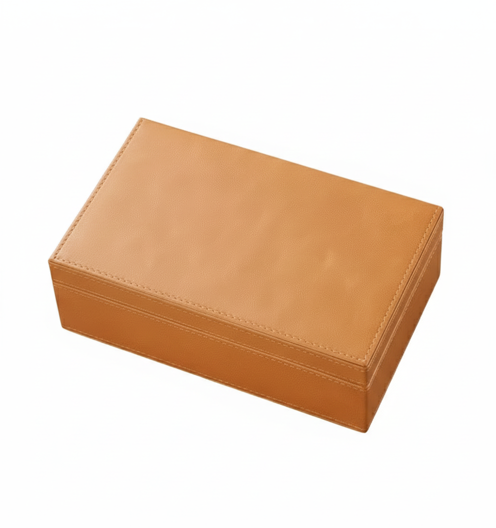 Brown leather signal blocking Faraday boxes that prevent car theft by blocking signal cloning relay attacks box on a white background
